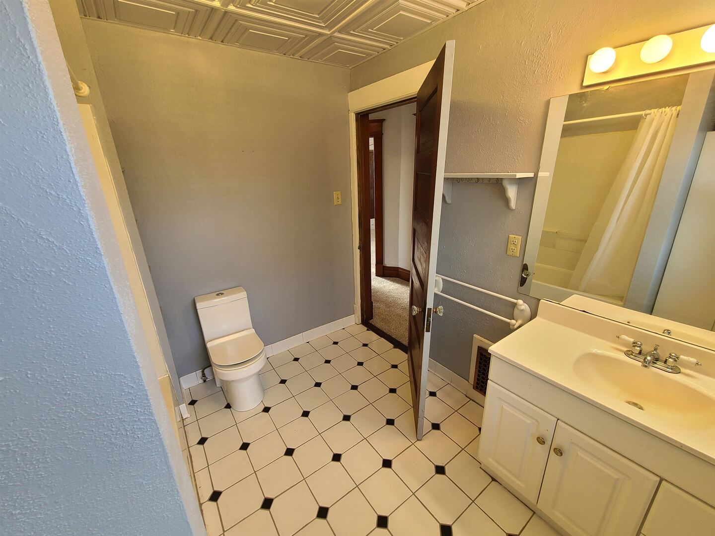 423 South Grove Street Walcott, IA 52773 - Photo 27 of 30 a bathroom with a sink toilet and shower