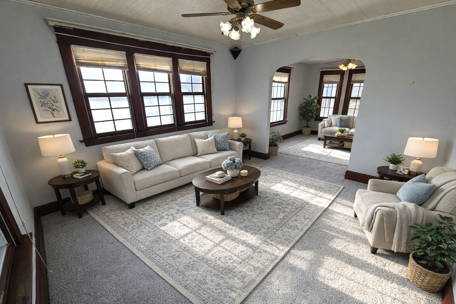 423 South Grove Street Walcott, IA 52773 - Photo 9 of 30 a living room with furniture and a large mirror next to a window