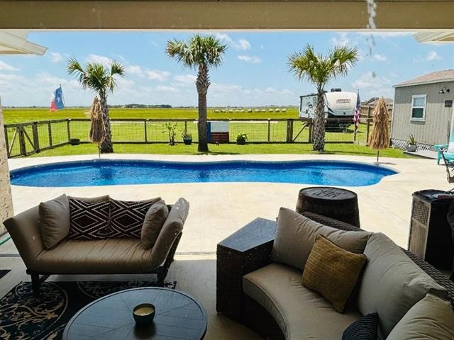 14845 Norma Jane Lane Beaumont, TX 77713 - Photo 24 of 35 a living room with furniture and painting on the wall