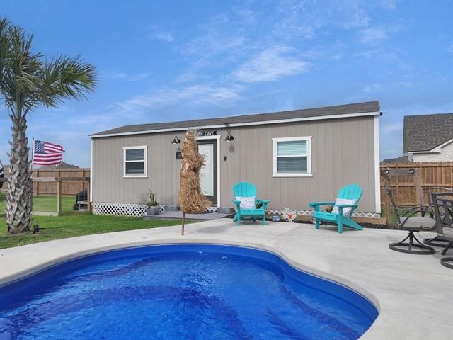 14845 Norma Jane Lane Beaumont, TX 77713 - Photo 27 of 35 a backyard of a house with table and chairs