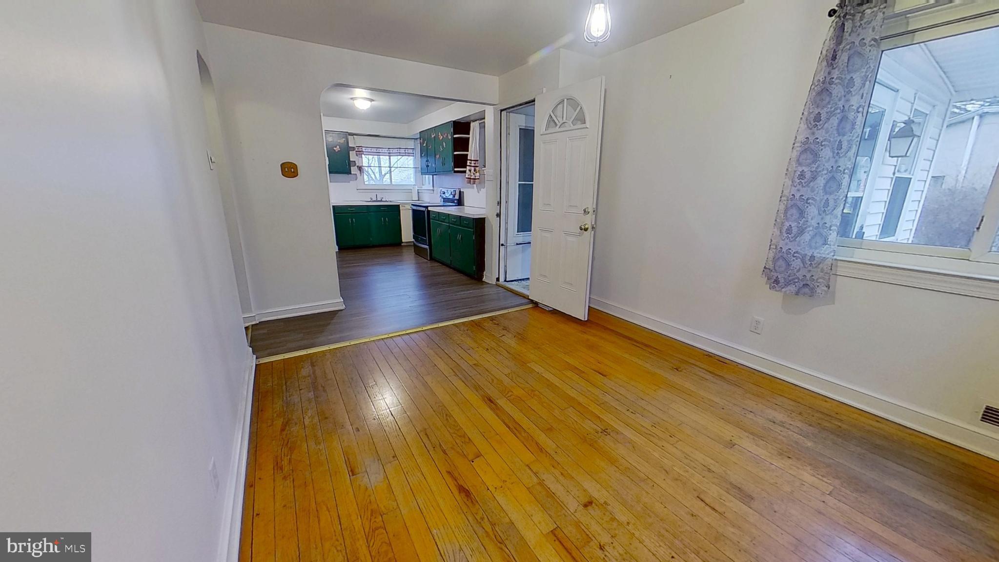 2821 South Queen Street Dallastown, PA 17313 - Photo 6 of 14 a view of a room with wooden floor