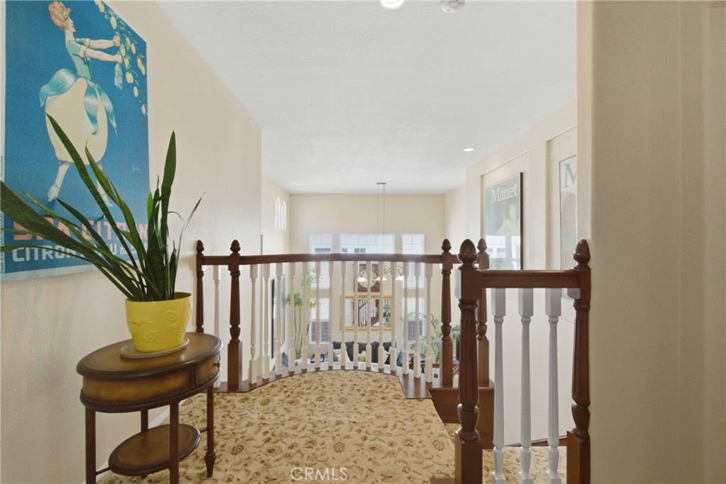 25120 Southwind Court Stevenson Ranch, CA 91381 - Photo 16 of 41 a view of entryway with wooden floor and stairs