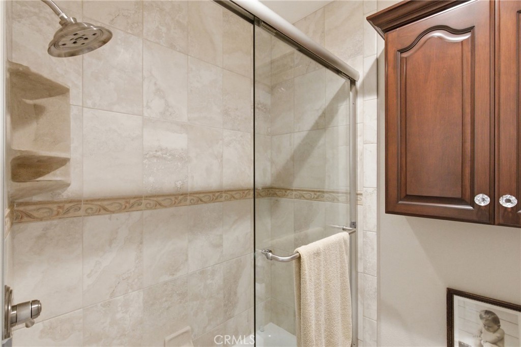 25120 Southwind Court Stevenson Ranch, CA 91381 - Photo 27 of 41 a bathroom with a shower