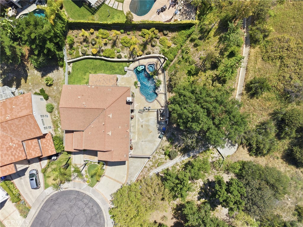 25120 Southwind Court Stevenson Ranch, CA 91381 - Photo 35 of 41 an aerial view of a house with a yard