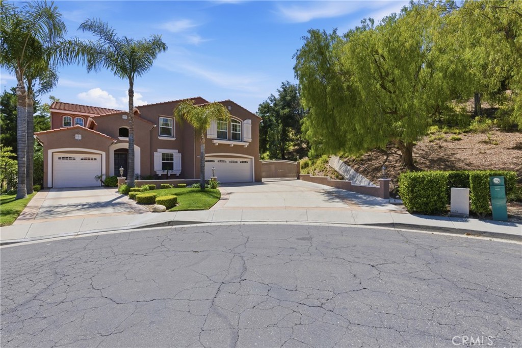 25120 Southwind Court Stevenson Ranch, CA 91381 - Photo 39 of 41 a view of multiple houses with palm trees