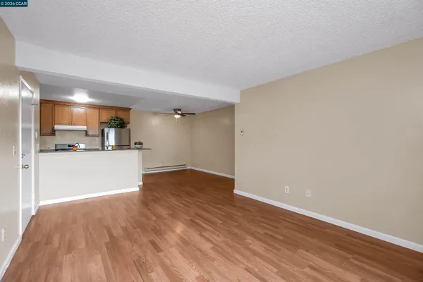 a view of kitchen with wooden floor