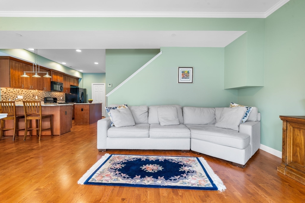 170 Beach Road, Unit 40 Salisbury, MA 01952 - Photo 9 of 32 a living room with furniture and a table