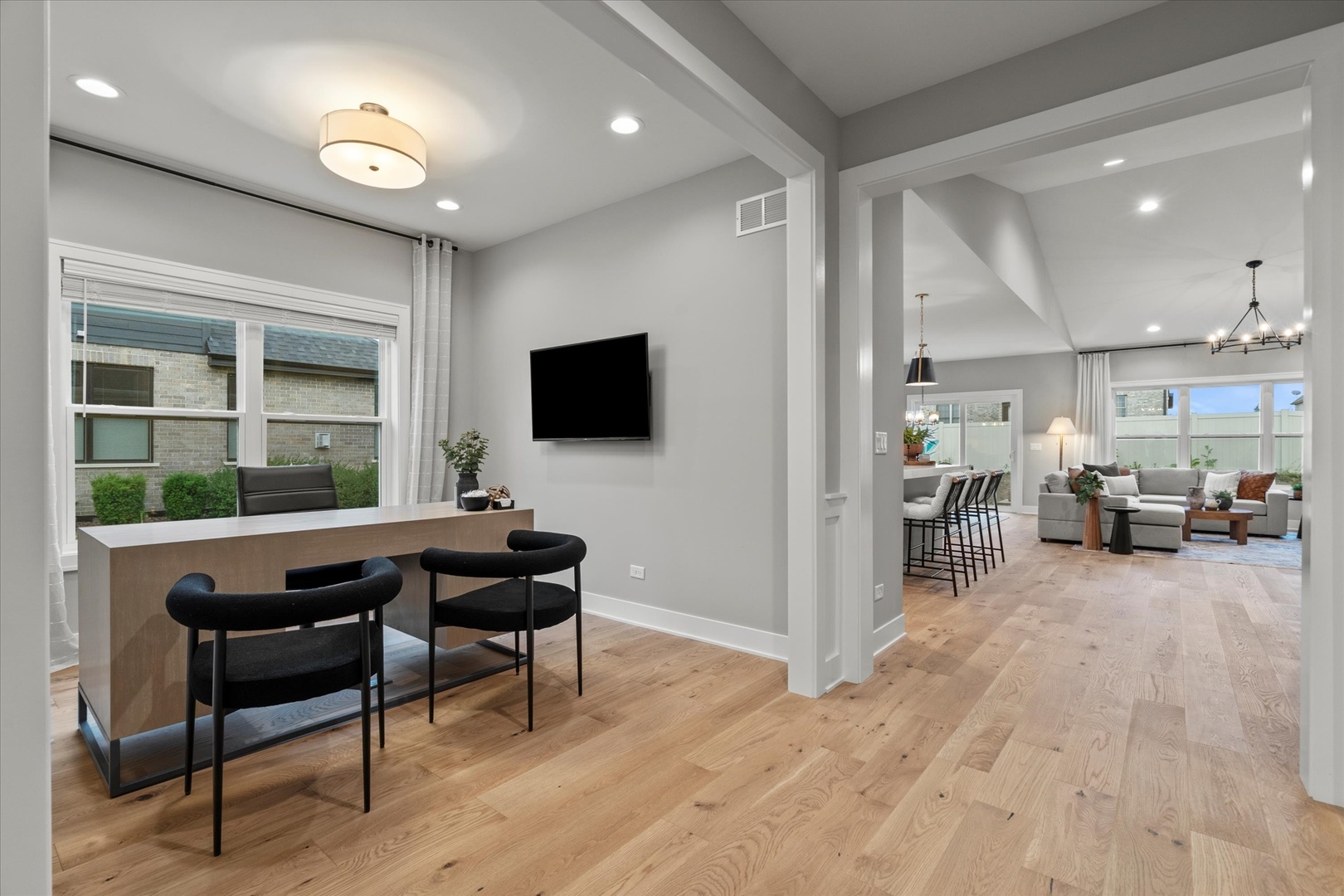 16580 Kayla Drive Lemont, IL 60439 - Photo 14 of 47 a living room with furniture and a flat screen tv