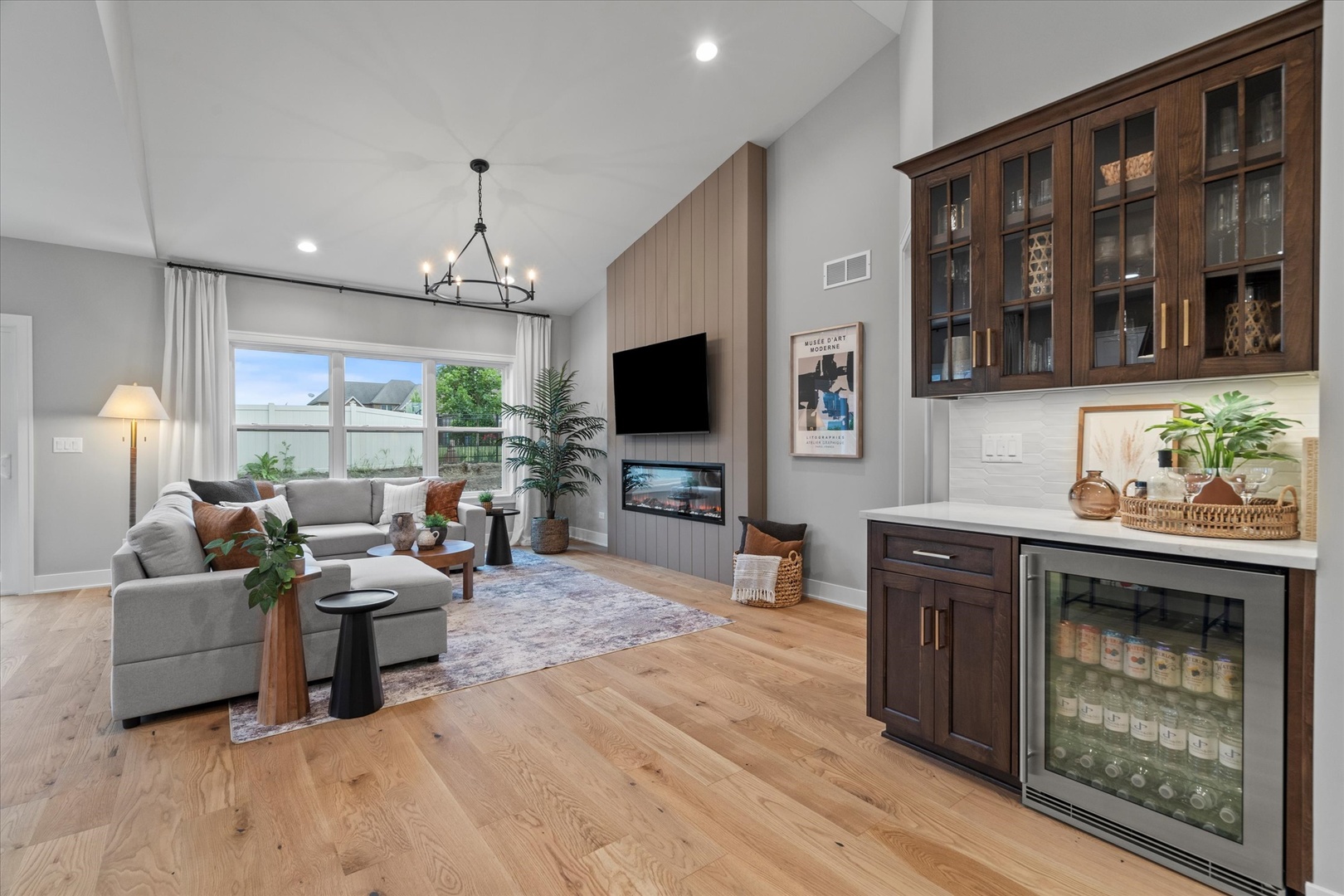 16580 Kayla Drive Lemont, IL 60439 - Photo 31 of 47 a living room with furniture and a flat screen tv