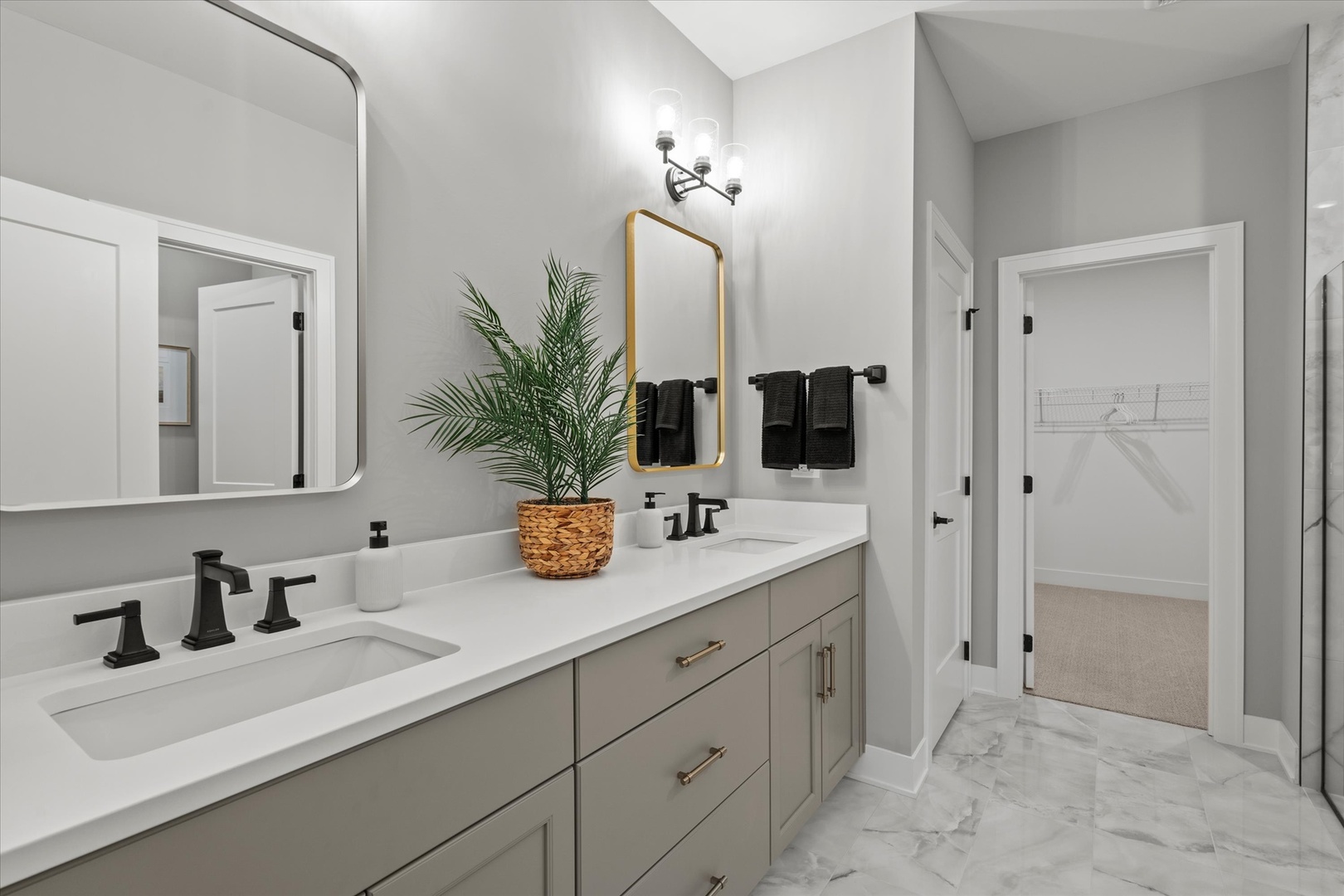 16580 Kayla Drive Lemont, IL 60439 - Photo 36 of 47 a bathroom with double sink and a mirror