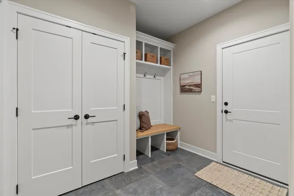 a view of storage and utility room with washer and dryer