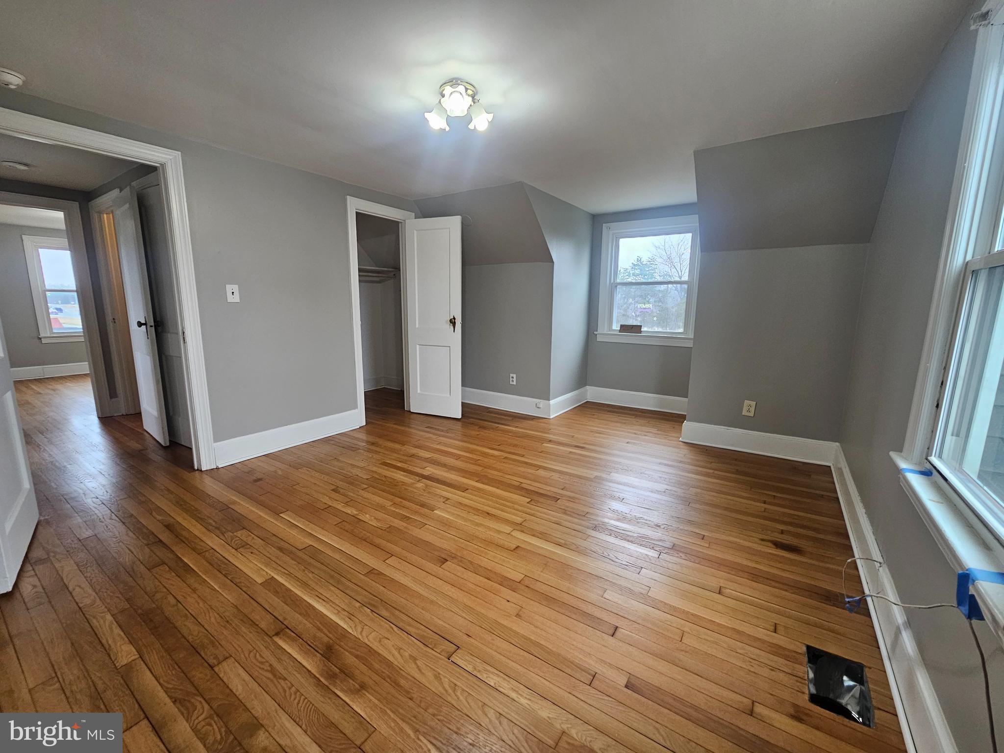 1431 Warrenton Road Fredericksburg, VA 22406 - Photo 15 of 25 wooden floor in an empty room with a window