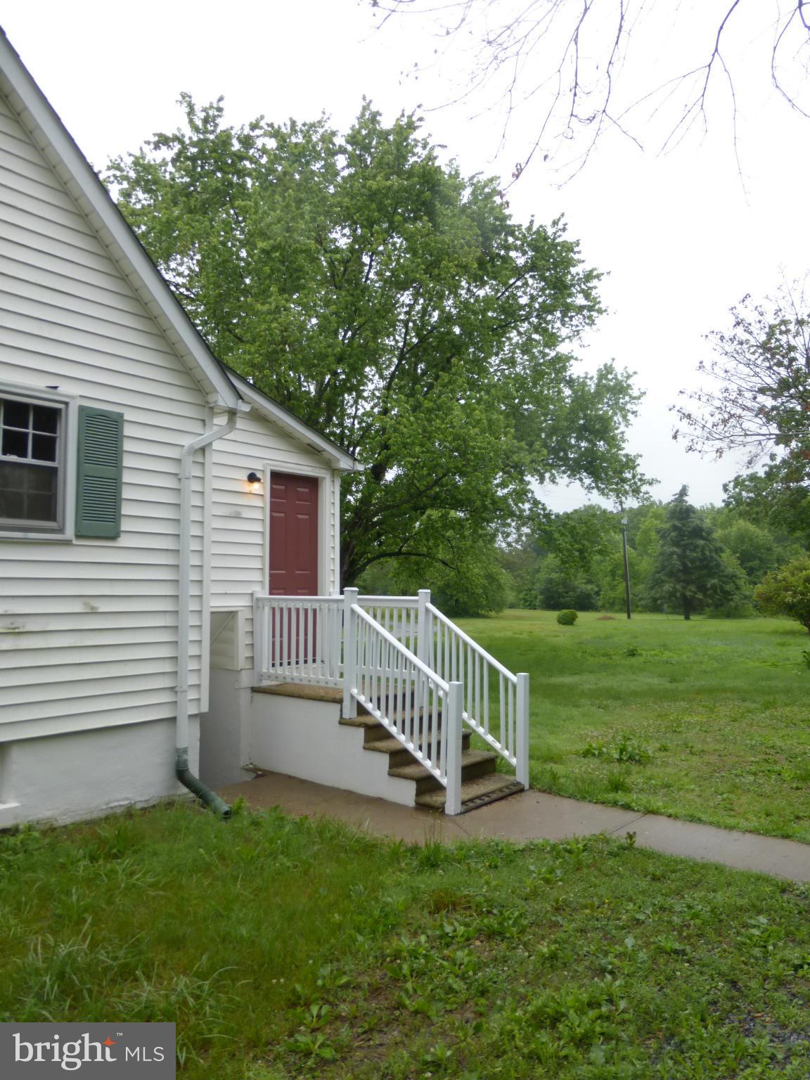 1431 Warrenton Road Fredericksburg, VA 22406 - Photo 21 of 25 a view of a house with a backyard