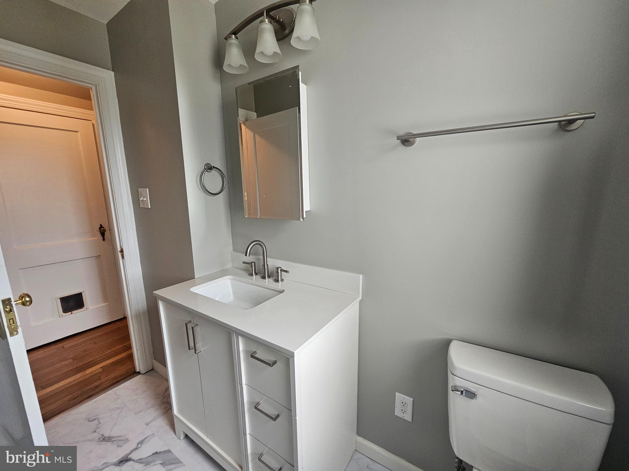 1431 Warrenton Road Fredericksburg, VA 22406 - Photo 9 of 25 a bathroom with a sink toilet and shower