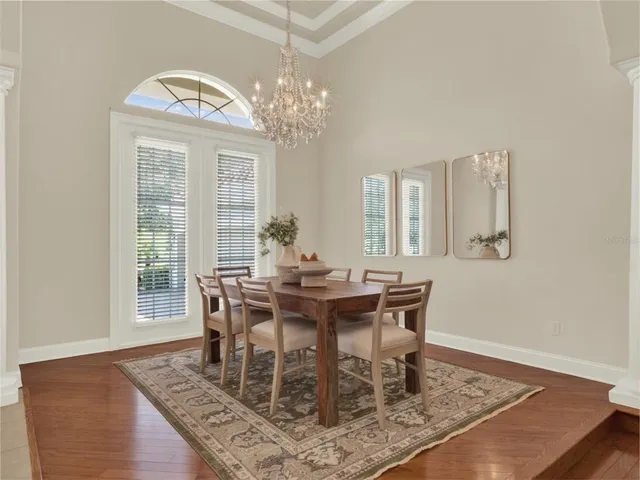 a living room with couches and view of living room