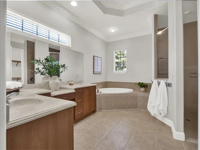 a white bath tub sitting in a bathroom