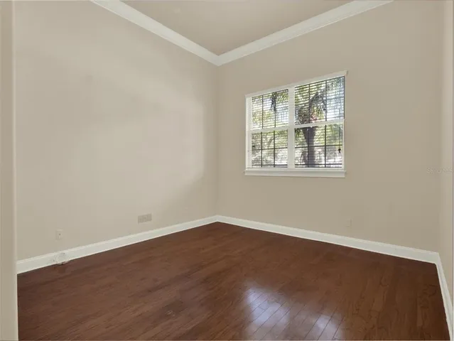 a bathroom with a granite countertop sink a toilet and shower a bathtub