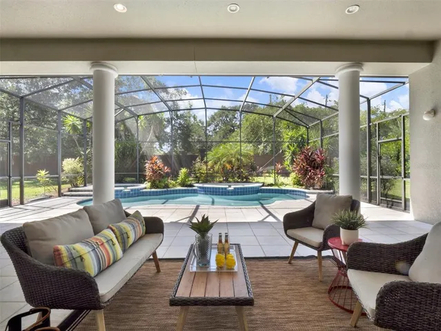 a view of a house with porch and sitting area