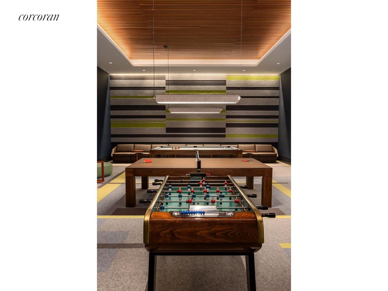 50 West 66th Street, Unit 62 Manhattan, NY 10023 - Photo 15 of 34 a room with a stove and a microwave