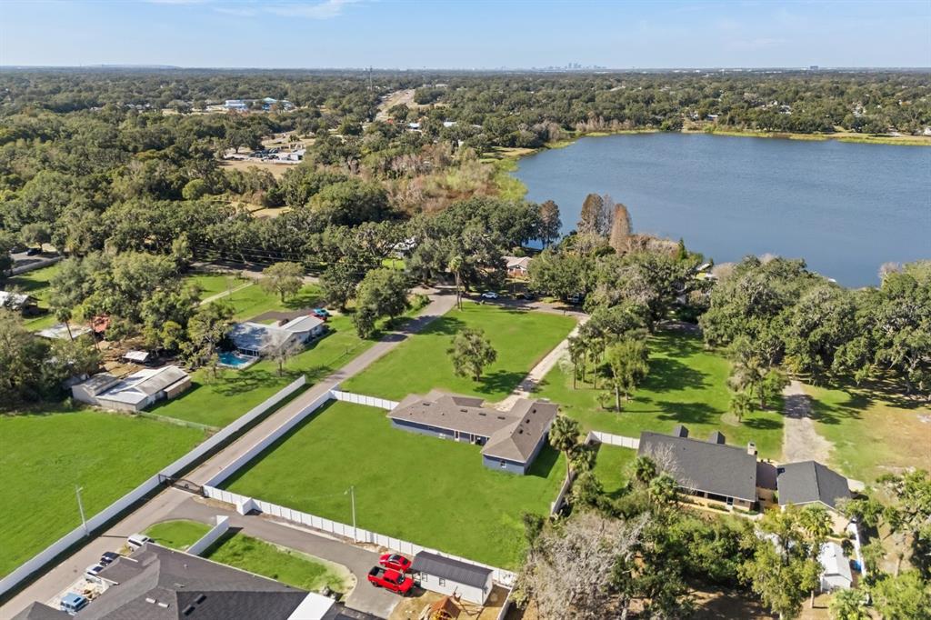 812 Chastain Road Seffner, FL 33584 - Photo 25 of 26 an aerial view of a houses with a lake view