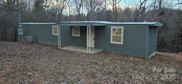 a view of backyard with green space
