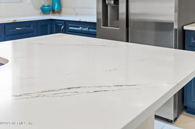 a bathroom with a sink a mirror and vanity