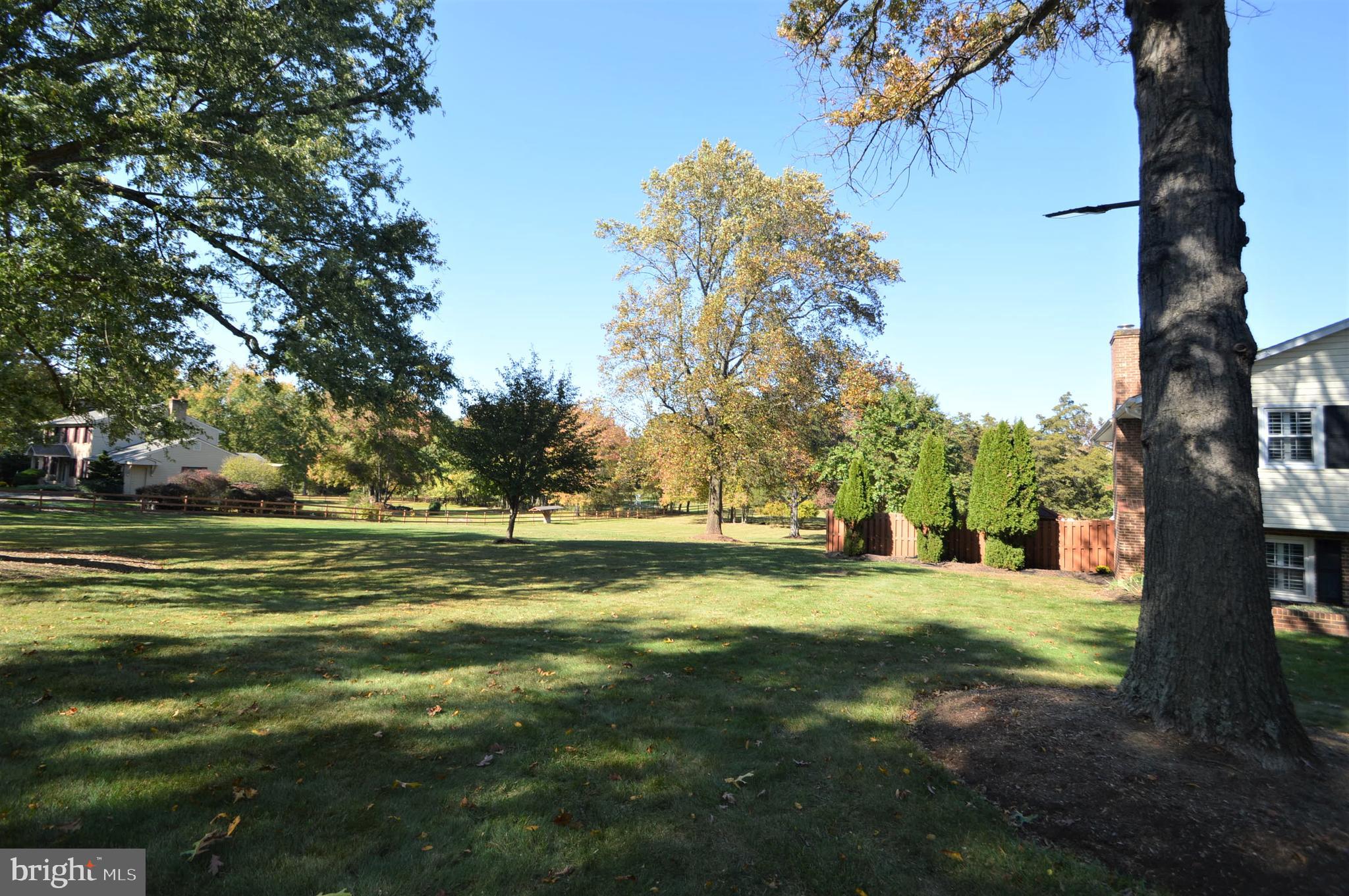 12614 Oxon Road Herndon, VA 20171 - Photo 11 of 71 a view of a golf course with a lake view
