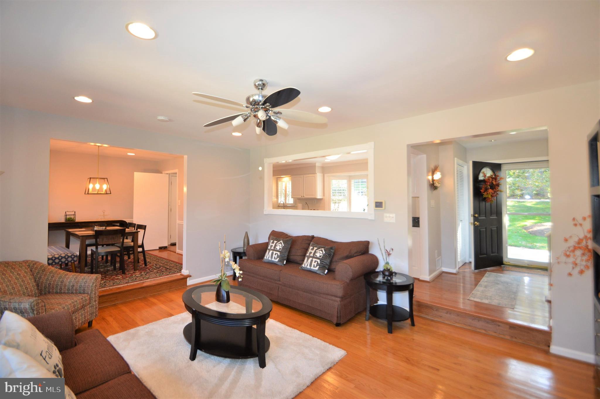 12614 Oxon Road Herndon, VA 20171 - Photo 42 of 71 a living room with furniture and a wooden floor