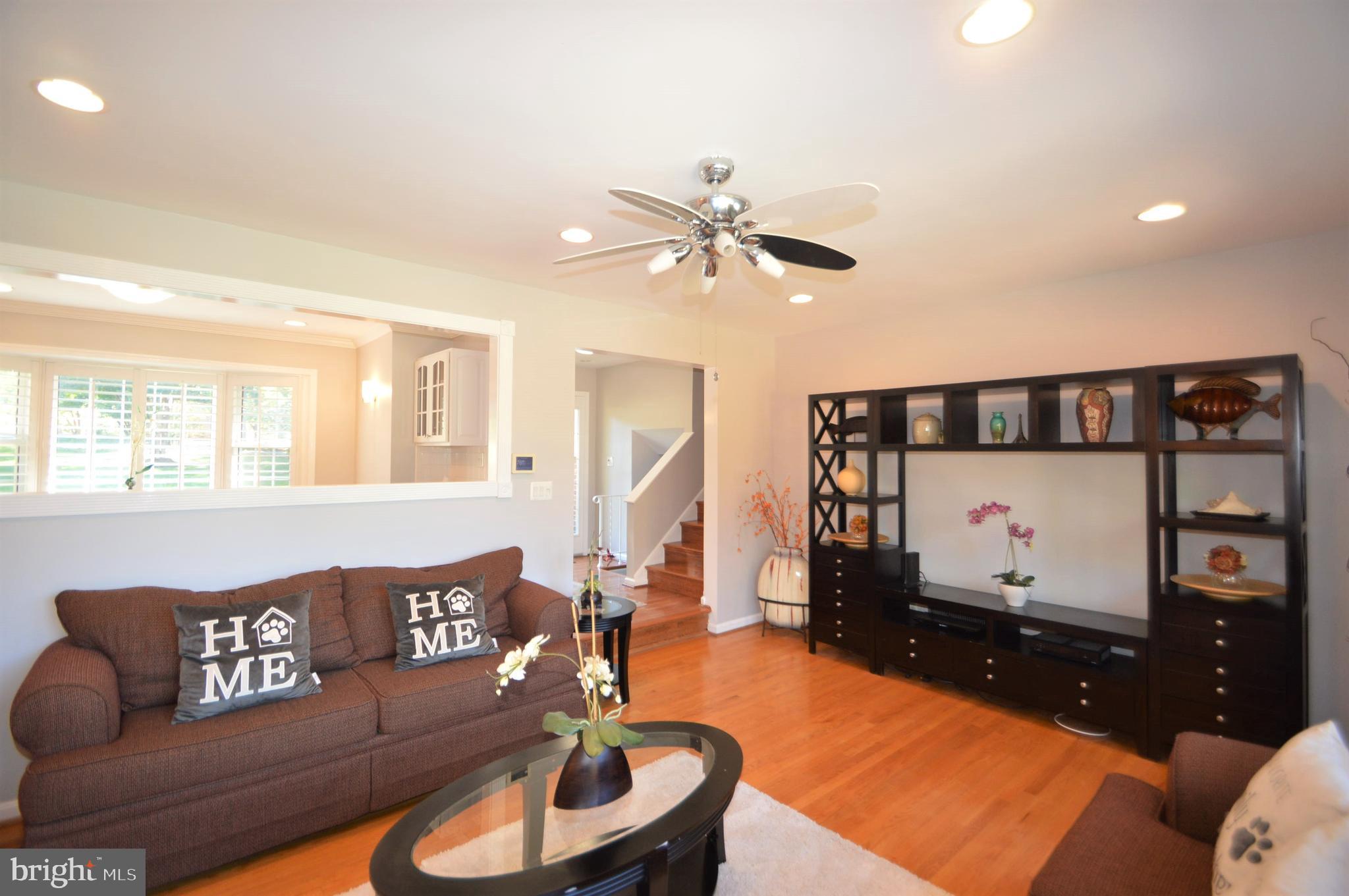 12614 Oxon Road Herndon, VA 20171 - Photo 43 of 71 a living room with furniture and a flat screen tv