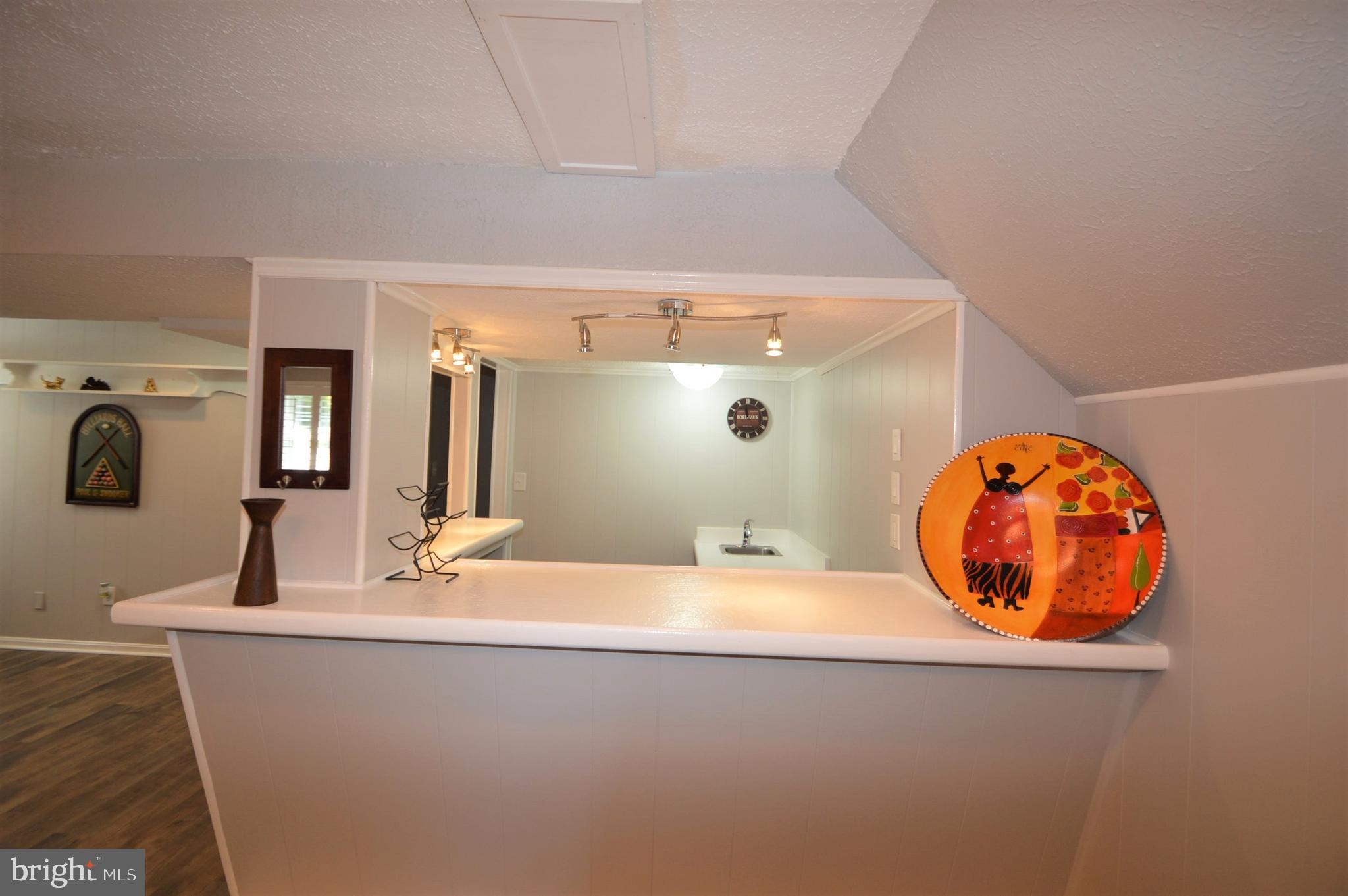 12614 Oxon Road Herndon, VA 20171 - Photo 61 of 71 a bathroom with a sink and a mirror