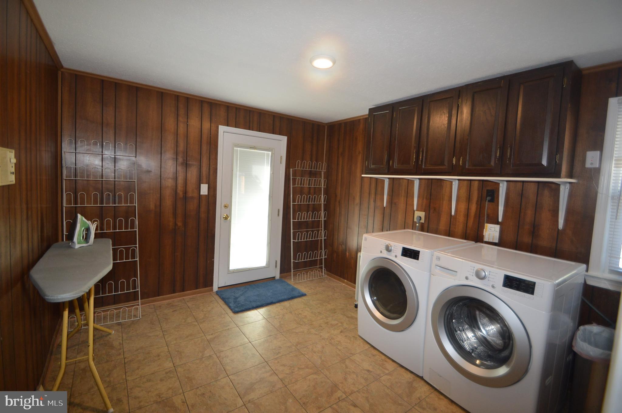 12614 Oxon Road Herndon, VA 20171 - Photo 66 of 71 a view of walk in closet with washer and dryer