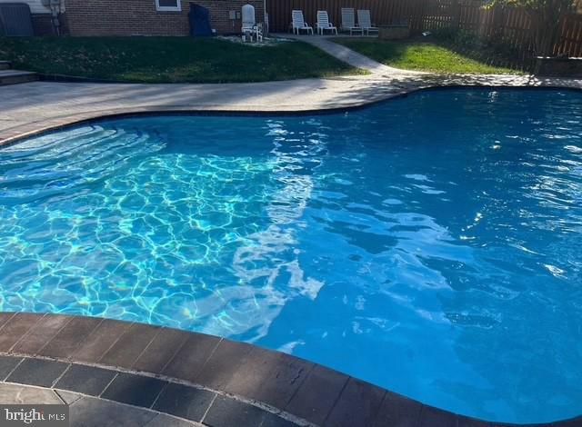 12614 Oxon Road Herndon, VA 20171 - Photo 10 of 71 a view of swimming pool from a yard