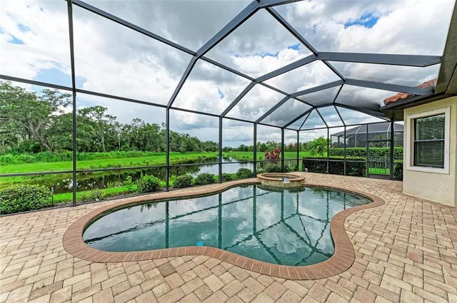 a view of a swimming pool with a porch
