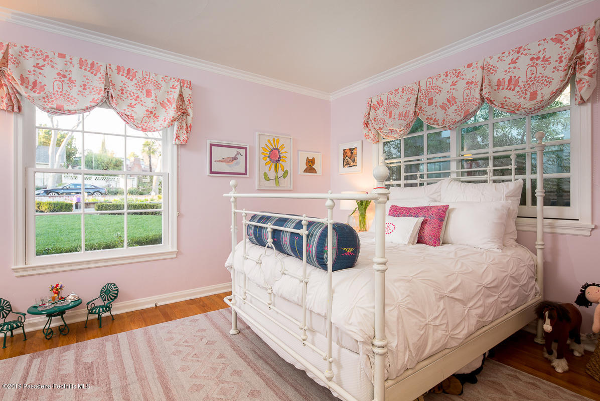 191 Sierra View Road Pasadena, CA 91105 - Photo 25 of 52 a large white bed sitting next to a window