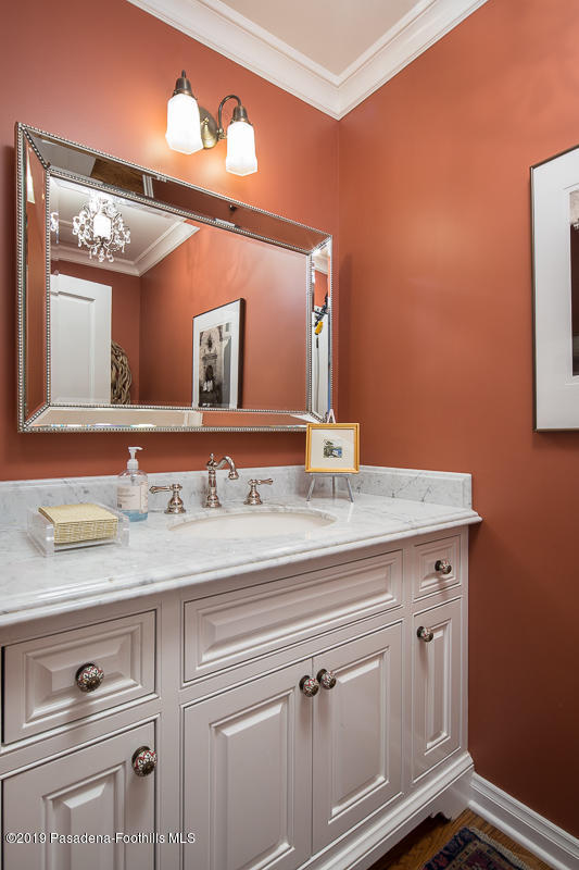 191 Sierra View Road Pasadena, CA 91105 - Photo 26 of 52 a bathroom with a sink and a mirror