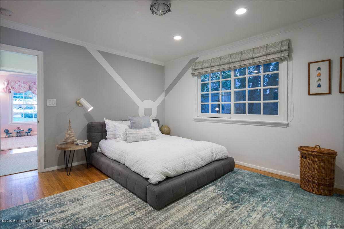 191 Sierra View Road Pasadena, CA 91105 - Photo 27 of 52 a bedroom with a bed and a window