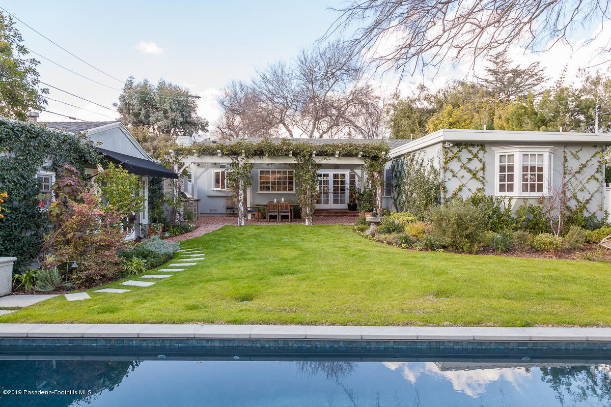 191 Sierra View Road Pasadena, CA 91105 - Photo 30 of 52 a view of a house with a backyard and a patio