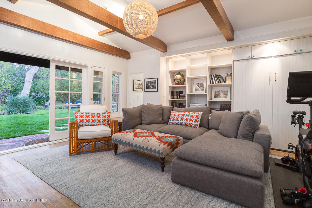 191 Sierra View Road Pasadena, CA 91105 - Photo 32 of 52 a living room with furniture and a flat screen tv