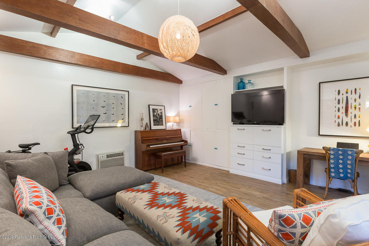 191 Sierra View Road Pasadena, CA 91105 - Photo 33 of 52 a living room with furniture and a flat screen tv