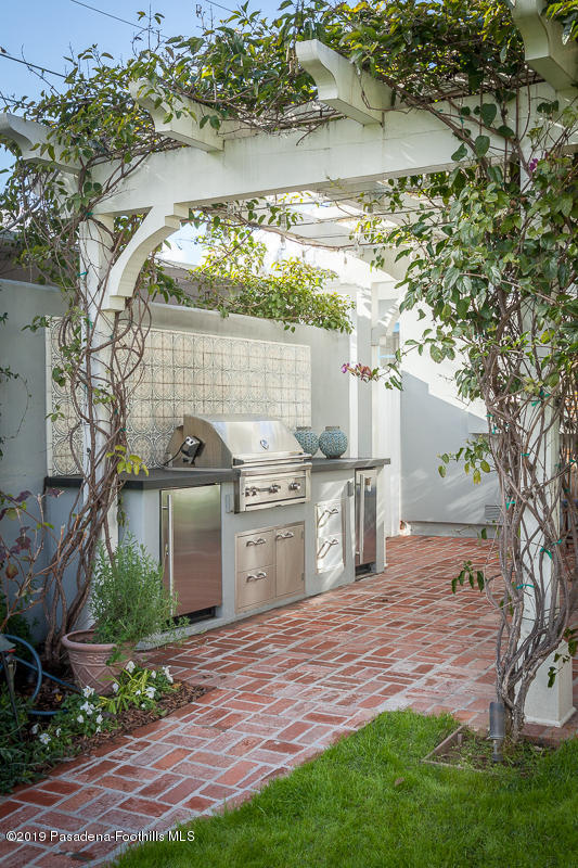 191 Sierra View Road Pasadena, CA 91105 - Photo 47 of 52 a view of a house with a yard and a lake