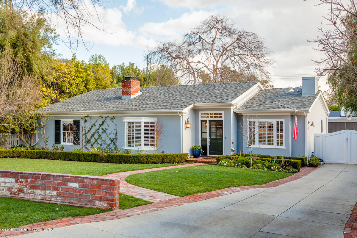 191 Sierra View Road Pasadena, CA 91105 - Photo 51 of 52 a front view of a house with a yard and garage