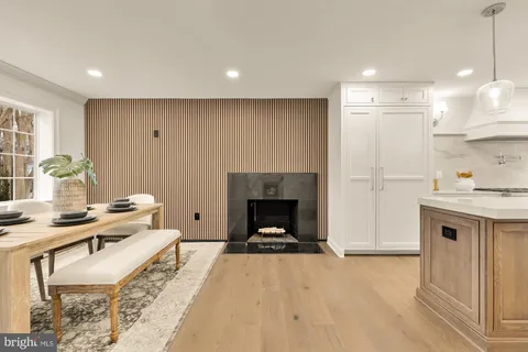 a bathroom with a shower and a glass door