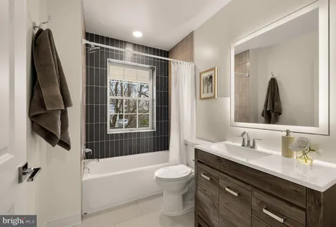 a view of a hallway with washer and dryer