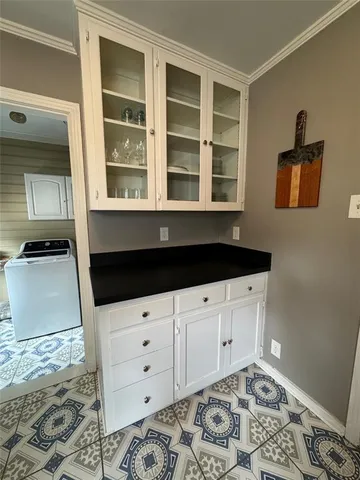 a kitchen with a sink and a window