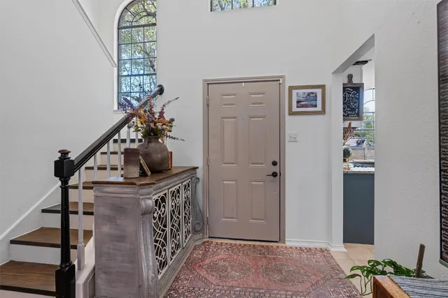 a view of entryway with a front door