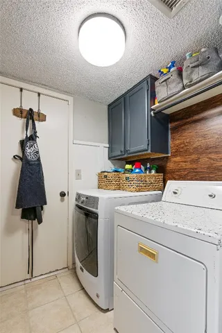 a kitchen with stainless steel appliances granite countertop a sink and a stove