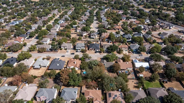 an aerial view of a city with lots of residential buildings