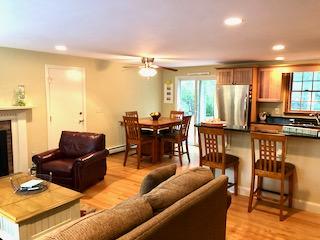136 East Osterville Road Osterville, MA 02655 - Photo 15 of 22 a living room with furniture and large windows