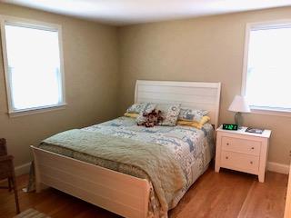 136 East Osterville Road Osterville, MA 02655 - Photo 9 of 22 a bedroom with a bed and window