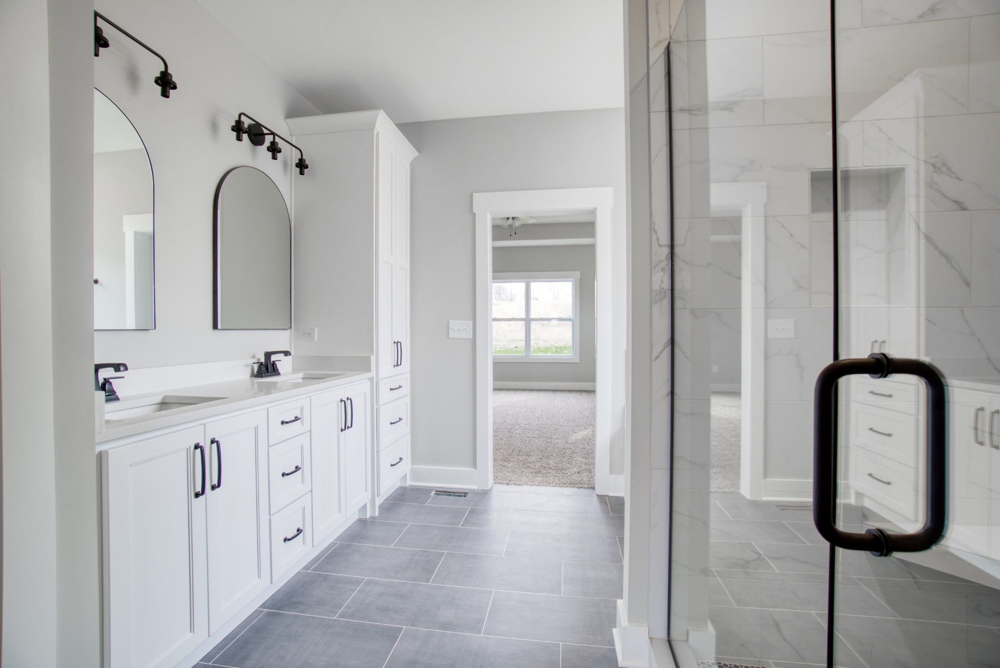 5665 Minnis Road Springfield, TN 37172 - Photo 33 of 38 a bathroom with a double vanity sink mirror and a bathtub
